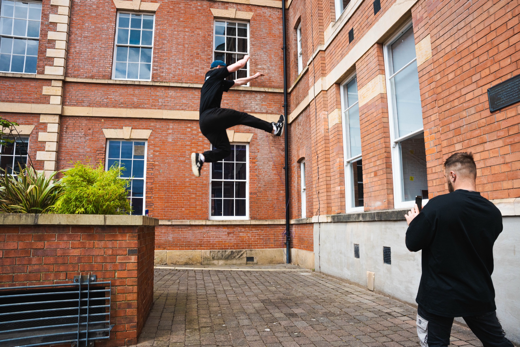 Athlete being filmed mid-jump at the SM Social V2 in Nottingham