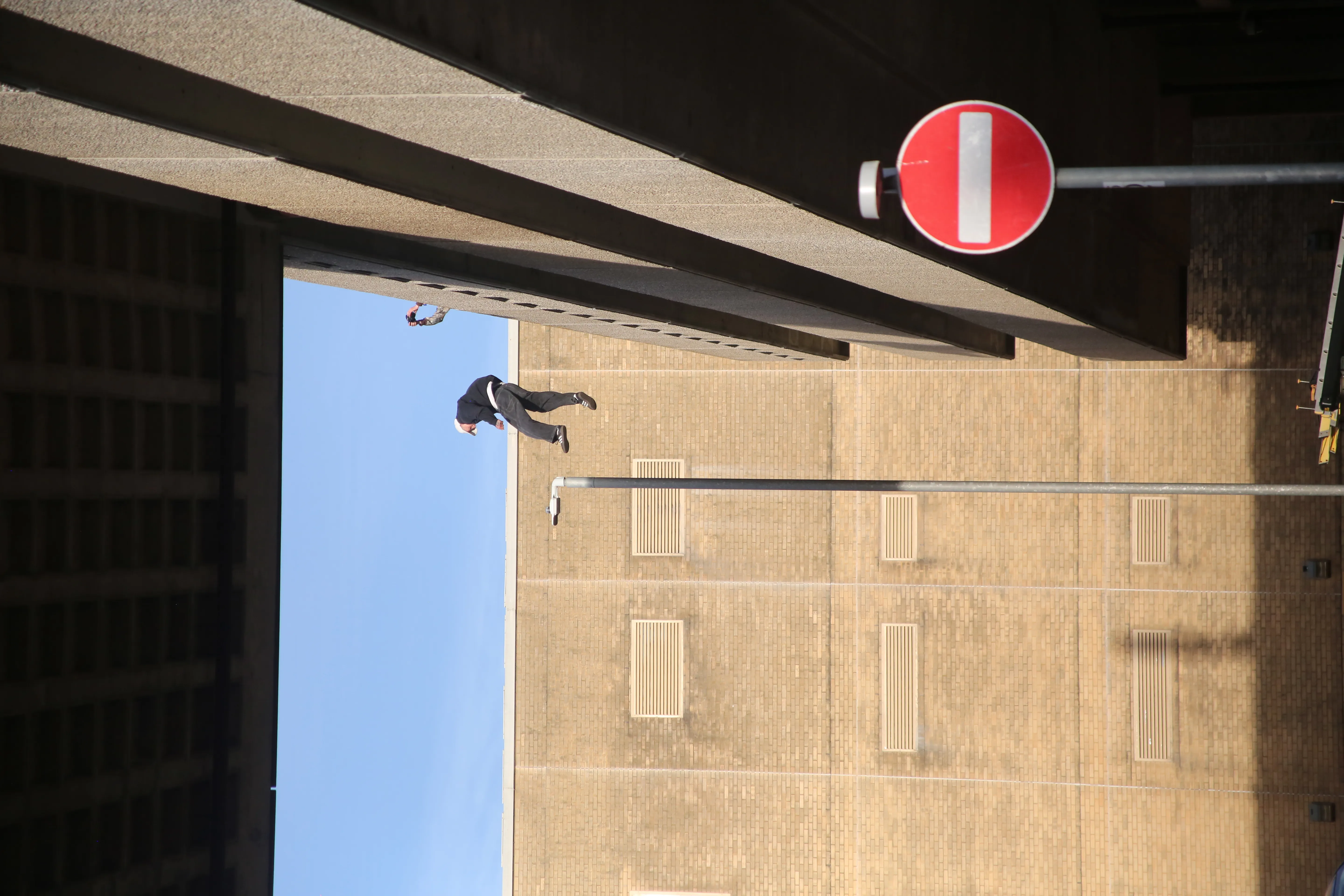 Parkour athletes collaborating on a project shoot