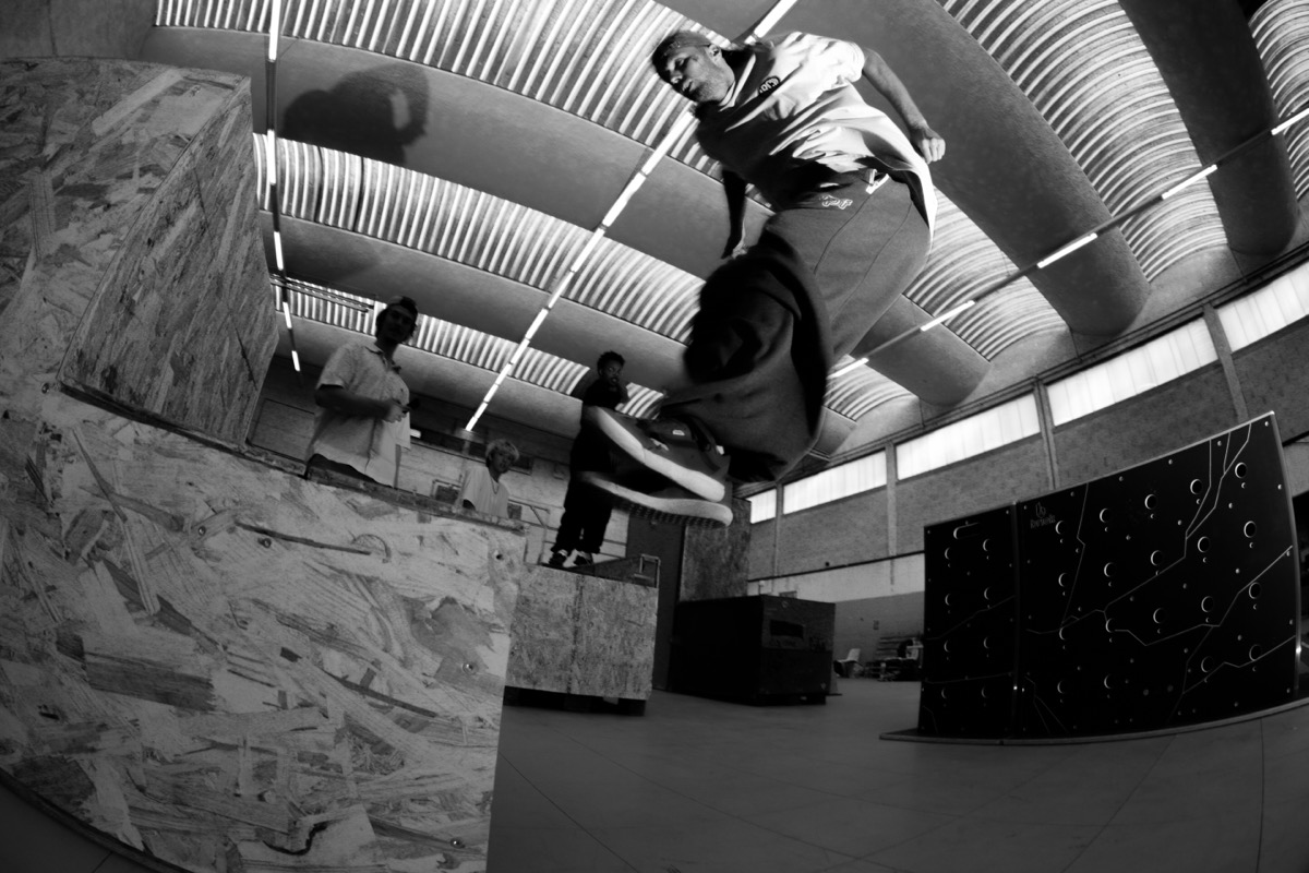 Athlete captured mid air during an AeroJam session, black and white photography