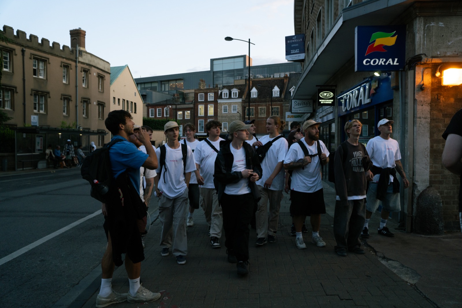 The Breach Culture crew walking together through a town at dusk