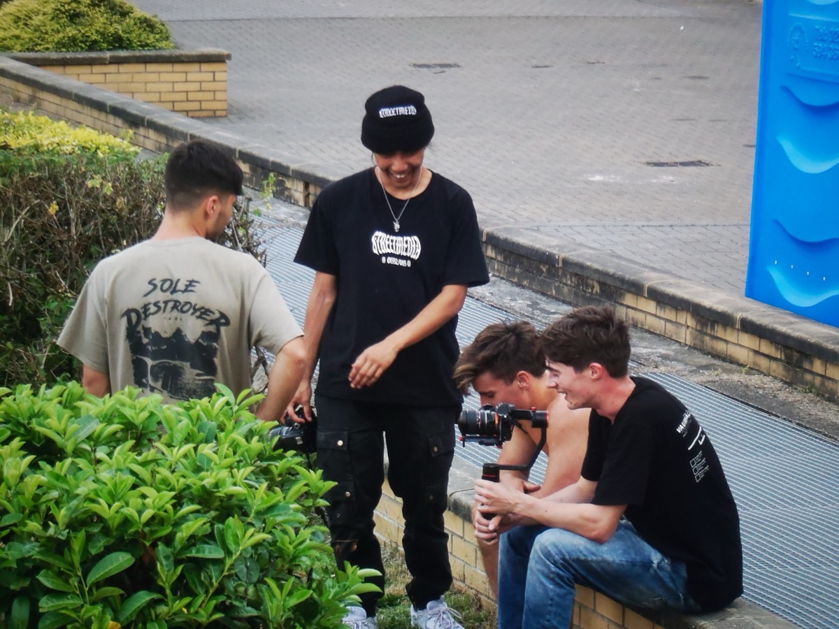 The Breach Culture crew reviewing footage on location